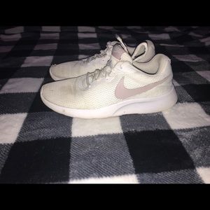 Very broke in Nike tennis shoes 7.5 W